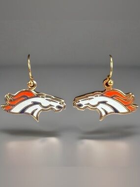 Goldtone, orange and white wild horse Mustang pierced earrings